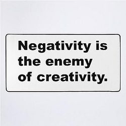 Negativity is the enemy of creativity. David Lynch Quote Desk Mat