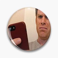 Dexter Morgan Cringes at a Phone Pin
