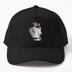 Kendrick Lamar Holding Baby Wearing a Baseball Cap