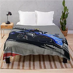 Franco Colapinto racing in his 2024 F1 race car watercolor throw blanket