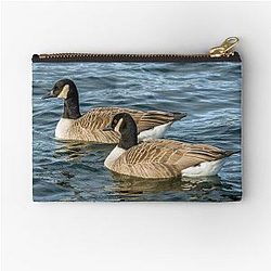 Two Canada Geese Swimming on a Lake with Zipper Pouch