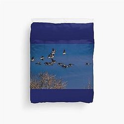 Geese in flight Duvet Cover