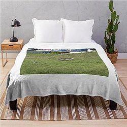 Grey geese on the river bank Throw Blanket
