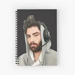 Hasan Piker wearing headphone spiral notebook