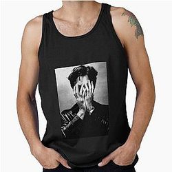 Hudson Williams Covering His Tank Top