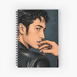 Hudson Williams of Heated Rivalry holding his lips Spiral Notebook