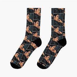 Hudson Williams of Heated Rivalry holding his Socks