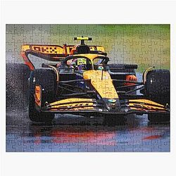 Lando Norris racing his 2024 F1 car in the rain on full wets. Jigsaw Puzzle