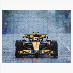 Lando Norris racing his 2024 F1 car during the Canadian Grand Prix in the rain from the front Jigsaw Puzzle