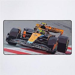 Lando Norris Racing His 2023 Race Car