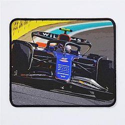 Logan Sargeant racing his 2024 F1 race car during the Miami Grand Prix Mouse Pad