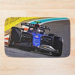 Logan Sargeant racing his 2024 F1 race car during the Miami Grand Prix
