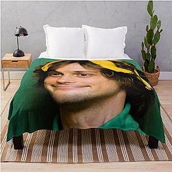 Matthew Gray Gubler with a banana throw blanket