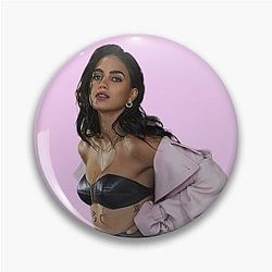 Melissa Barrera in a pink coat
