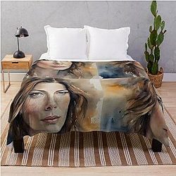 Image of Michelle Monaghan with a throw blanket