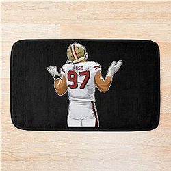 Nick Bosa after sacking a bath mat