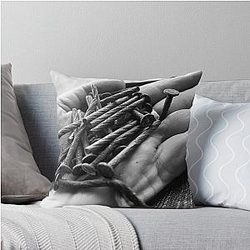 Handful of rusty nails throw pillow