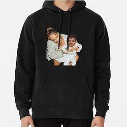 Rihanna and her son Omar, interviewed by Omar Rudberg, appears in a pullover hoodie. 
 Removed the weird characters and the duplicate word "Rihanna".