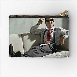 American Psycho: Patrick Bateman laying in a couch with style