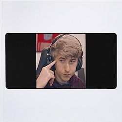 Purple face reveal Desk Mat