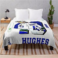 Quinn Hughes hockey player design throw blanket