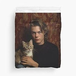 River Phoenix with his pet cat