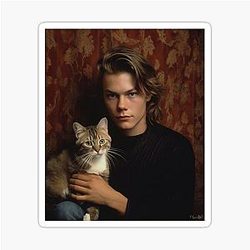 River Phoenix with his pet cat Sticker