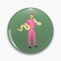Robert Irwin in a Pink Suit on DWTS with a Snake Pin Sticker