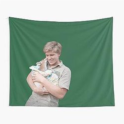 Robert Irwin with a baby kangaroo tapestry