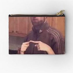 Robert Pattinson brown suit Pouch