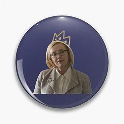 Gerri from Succession with a crown pin