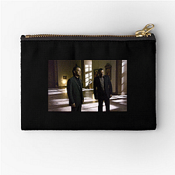 The Da Vinci Code's plot involves a murder at the Louvre The Da Vinci Code Zipper Pouches