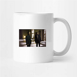 The Da Vinci Code's plot involves a murder at the Louvre The Da Vinci Code Mugs