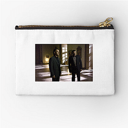 The Da Vinci Code's plot involves a murder at the Louvre The Da Vinci Code Zipper Pouches