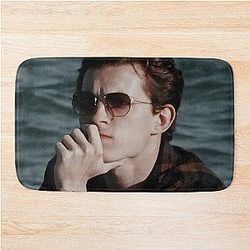 Tom holland relaxing on the beach Bath Mat