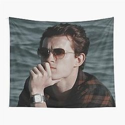 Tom Holland relaxing on the beach tapestry