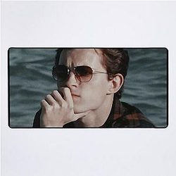Tom Holland Relaxing on a Beach Desk Mat