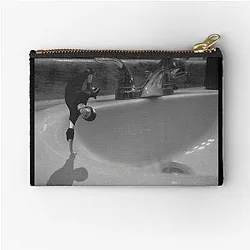 Tony Hawk skateboarding in the sink Zipper