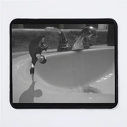 Tony Hawk skateboarding on a mouse pad