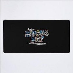Greetings from Widow's Bay Desk Mat