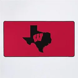 Wisconsin Badgers Fans in Texas Desk Mat (after removing the weird character ~) 
Wisconsin Badgers Fan in Texas Desk Mat