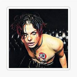 Yungblud on a leather chair